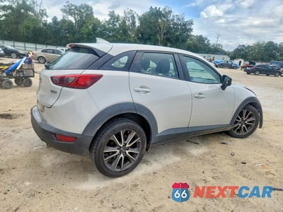 Trzecie zdjęcie samochodu z tyłu: 2017 MAZDA CX-3 TOURING VIN:JM1DKDC71H0179480 - miniatura