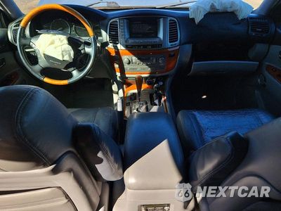 Zdjęcie 8 z 12 samochodu: 2004 LEXUS LX 470 VIN:JTJHT00W143542093 - miniatura