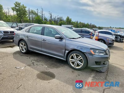 Czwarte zdjęcie samochodu z boku: 2015 VOLKSWAGEN PASSAT SE VIN:1VWBV7A34FC034247 - miniatura