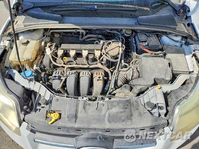 Zdjęcie 11 z 12 samochodu: 2014 FORD FOCUS S VIN:1FADP3E25EL410264 - miniatura