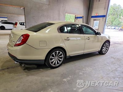 Trzecie zdjęcie samochodu z tyłu: 2014 LINCOLN MKS VIN:1LNHL9DK8EG607865 - miniatura