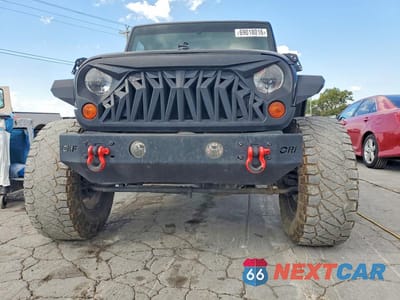 Piąte zdjęcie samochodu w środku: 2011 JEEP WRANGLER UNLIMITED SPORT VIN:1J4BA3H15BL579244 - miniatura