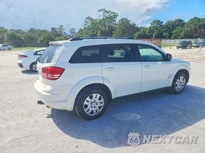 Trzecie zdjęcie samochodu z tyłu: 2017 DODGE JOURNEY SE VIN:3C4PDCAB2HT700802 - miniatura
