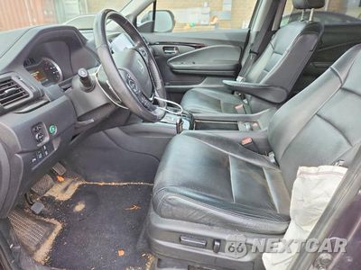 Zdjęcie 7 z 14 samochodu: 2017 HONDA PILOT TOURING VIN:5FNYF6H91HB075942 - miniatura