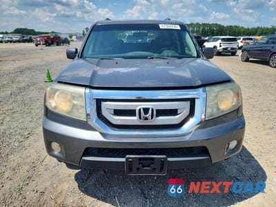 Piąte zdjęcie samochodu w środku: 2011 HONDA PILOT EX VIN:5FNYF4H44BB015749 - miniatura