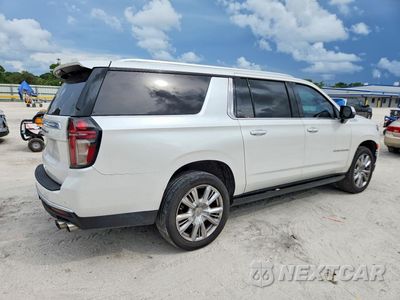 Trzecie zdjęcie samochodu z tyłu: 2021 CHEVROLET SUBURBAN K1500 HIGH COUNTRY VIN:1GNSKGKL9MR209264 - miniatura