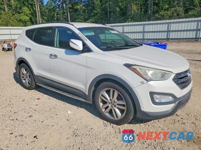 Czwarte zdjęcie samochodu z boku: 2014 HYUNDAI SANTA FE SPORT 2.0T VIN:5XYZUDLA4EG197876 - miniatura