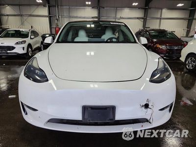 Piąte zdjęcie samochodu w środku: 2022 TESLA MODEL Y VIN:7SAYGDEE1NF312852 - miniatura