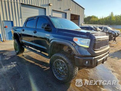 Czwarte zdjęcie samochodu z boku: 2014 TOYOTA TUNDRA CREWMAX PLATINUM VIN:5TFAW5F13EX342671 - miniatura
