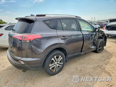 Trzecie zdjęcie samochodu z tyłu: 2018 TOYOTA RAV4 LE VIN:JTMBFREV5JJ717229 - miniatura