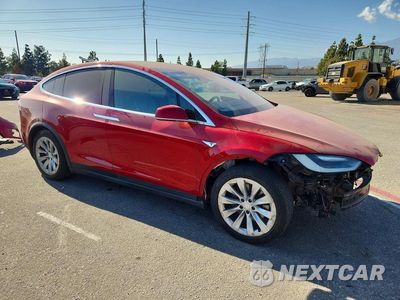 Czwarte zdjęcie samochodu z boku: 2016 TESLA MODEL X VIN:5YJXCAE21GF002941 - miniatura