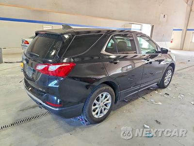 Trzecie zdjęcie samochodu z tyłu: 2021 CHEVROLET EQUINOX LT VIN:2GNAXUEVXM6155431 - miniatura