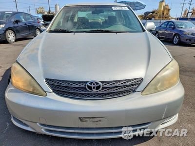 Piąte zdjęcie samochodu w środku: 2003 TOYOTA CAMRY LE VIN:JTDBE32K630157434 - miniatura