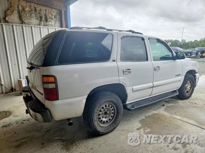 Trzecie zdjęcie samochodu z tyłu: 2001 CHEVROLET TAHOE C1500 VIN:1GNEC13T61R161207 - miniatura