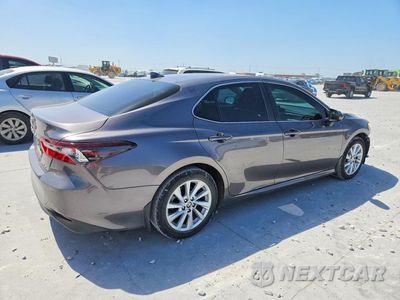 Trzecie zdjęcie samochodu z tyłu: 2024 TOYOTA CAMRY LE VIN:4T1C11AK7RU253821 - miniatura