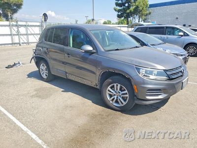 Czwarte zdjęcie samochodu z boku: 2013 VOLKSWAGEN TIGUAN S VIN:WVGAV3AX2DW609222 - miniatura
