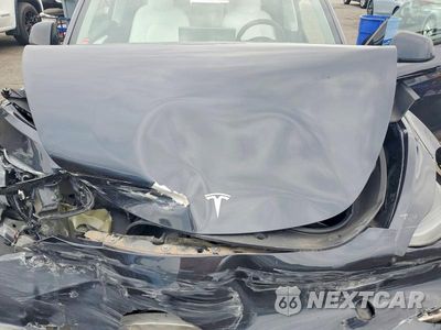 Zdjęcie 11 z 12 samochodu: 2024 TESLA MODEL Y VIN:7SAYGDEE9RA254248 - miniatura