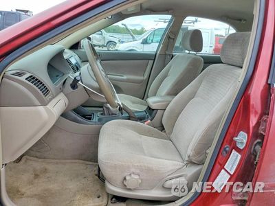 Zdjęcie 7 z 12 samochodu: 2002 TOYOTA CAMRY LE VIN:JTDBE32K620079588 - miniatura