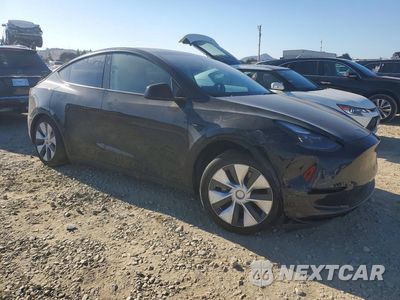 Czwarte zdjęcie samochodu z boku: 2023 TESLA MODEL Y VIN:7SAYGAEE4PF884418 - miniatura