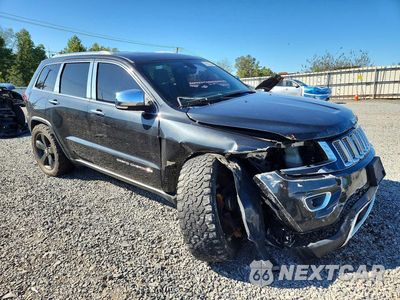 Czwarte zdjęcie samochodu z boku: 2014 JEEP GRAND CHEROKEE LIMITED VIN:1C4RJFBG5EC546266 - miniatura