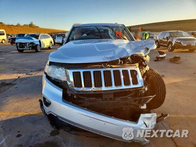 Piąte zdjęcie samochodu w środku: 2013 JEEP GRAND CHEROKEE LAREDO VIN:1C4RJFAG8DC635913 - miniatura