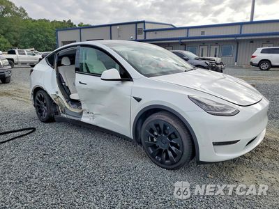 Czwarte zdjęcie samochodu z boku: 2021 TESLA MODEL Y VIN:5YJYGDEE7MF093519 - miniatura
