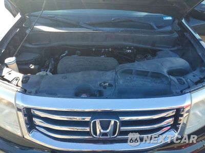 Zdjęcie 12 z 13 samochodu: 2013 HONDA PILOT TOURING VIN:5FNYF3H98DB006383 - miniatura