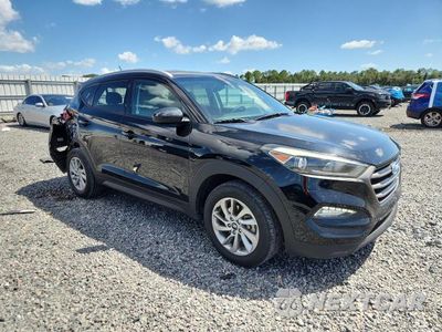 Czwarte zdjęcie samochodu z boku: 2016 HYUNDAI TUCSON SE VIN:KM8J33A41GU145643 - miniatura