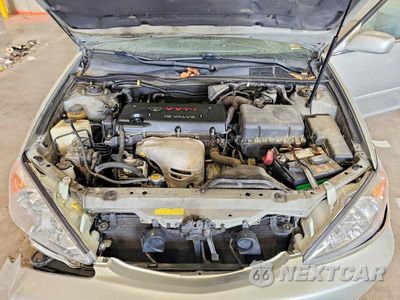 Zdjęcie 11 z 12 samochodu: 2002 TOYOTA CAMRY LE VIN:4T1BE30K72U087349 - miniatura