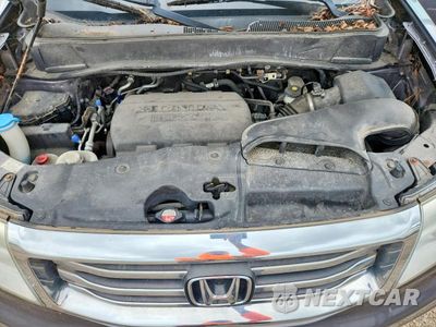 Zdjęcie 11 z 12 samochodu: 2014 HONDA PILOT EXL VIN:5FNYF4H5XEB029197 - miniatura