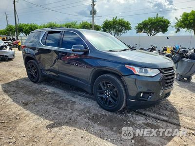 Czwarte zdjęcie samochodu z boku: 2018 CHEVROLET TRAVERSE LT VIN:1GNERGKWXJJ206726 - miniatura