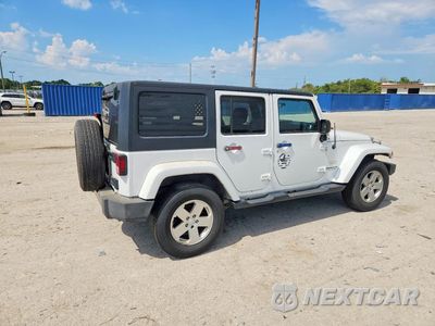 Trzecie zdjęcie samochodu z tyłu: 2011 JEEP WRANGLER VIN:1J4HA5H12BL588442 - miniatura