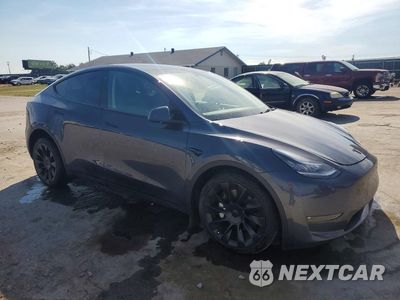 Czwarte zdjęcie samochodu z boku: 2022 TESLA MODEL Y VIN:7SAYGDEEXNF504822 - miniatura