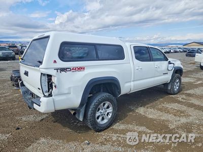 Trzecie zdjęcie samochodu z tyłu: 2021 TOYOTA TACOMA TRD OFF-ROAD VIN:3TMDZ5BN7MM108521 - miniatura