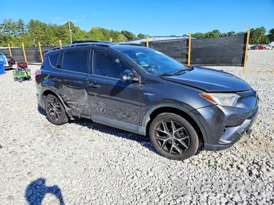 Czwarte zdjęcie samochodu z boku: 2018 TOYOTA RAV4 HV SE VIN:JTMJJREV0JD181668 - miniatura