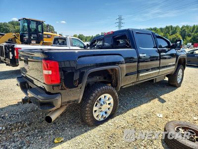 Trzecie zdjęcie samochodu z tyłu: 2016 GMC SIERRA K2500 DENALI VIN:1GT12UE8XGF138432 - miniatura