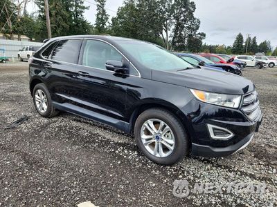 Czwarte zdjęcie samochodu z boku: 2017 FORD EDGE SEL VIN:2FMPK3J90HBC27122 - miniatura