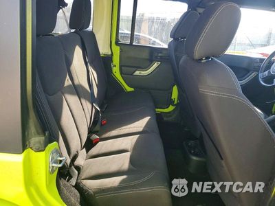 Zdjęcie 11 z 14 samochodu: 2016 JEEP WRANGLER UNLIMITED SAHARA VIN:1C4BJWEG2GL304664 - miniatura