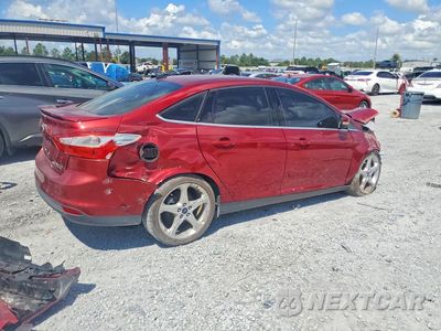 Trzecie zdjęcie samochodu z tyłu: 2014 FORD FOCUS TITANIUM VIN:1FADP3J27EL153193 - miniatura