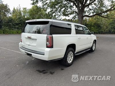 Czwarte zdjęcie samochodu z boku: 2019 GMC YUKON XL K1500 SLT VIN:1GKS2GKC2KR289548 - miniatura