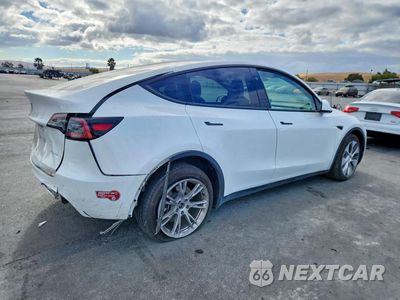 Trzecie zdjęcie samochodu z tyłu: 2024 TESLA MODEL Y VIN:7SAYGDEE5RF989036 - miniatura