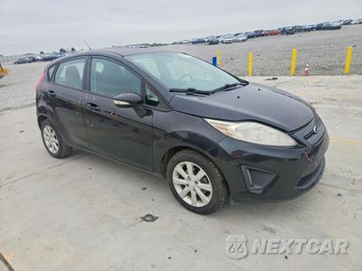 Czwarte zdjęcie samochodu z boku: 2013 FORD FIESTA SE VIN:3FADP4EJ1DM199123 - miniatura