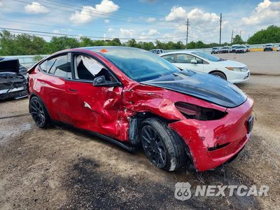 Czwarte zdjęcie samochodu z boku: 2022 TESLA MODEL Y VIN:7SAYGDEE3NF481447 - miniatura