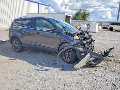 Czwarte zdjęcie samochodu z boku: 2017 FORD ESCAPE TITANIUM VIN:1FMCU0JD0HUE51903 - miniatura