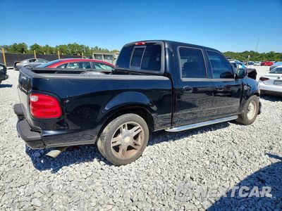 Trzecie zdjęcie samochodu z tyłu: 2001 FORD F150 SUPERCREW VIN:1FTRW07L11KA40471 - miniatura