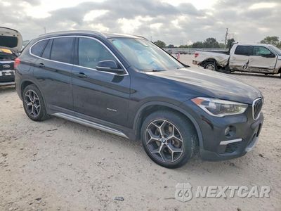 Czwarte zdjęcie samochodu z boku: 2017 BMW X1 XDRIVE28I VIN:WBXHT3Z39H4A57624 - miniatura