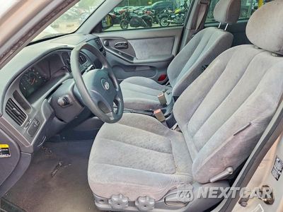 Zdjęcie 7 z 12 samochodu: 2004 HYUNDAI ELANTRA GLS VIN:KMHDN46D44U916260 - miniatura