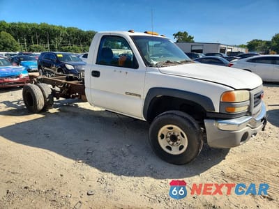 Czwarte zdjęcie samochodu z boku: 2005 GMC NEW SIERRA C3500 VIN:1GDJC34U85E277804 - miniatura