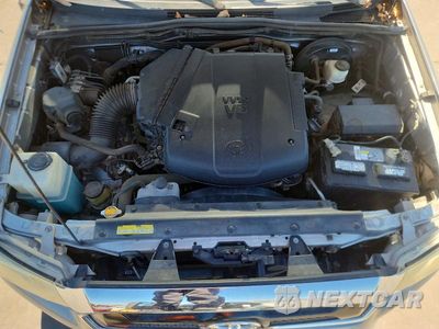Zdjęcie 11 z 12 samochodu: 2015 TOYOTA TACOMA V6 VIN:5TFLU4EN1FX139440 - miniatura