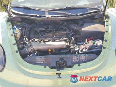 Zdjęcie 11 z 12 samochodu: 2002 VOLKSWAGEN NEW BEETLE GLX VIN:3VWDD21C52M403477 - miniatura
